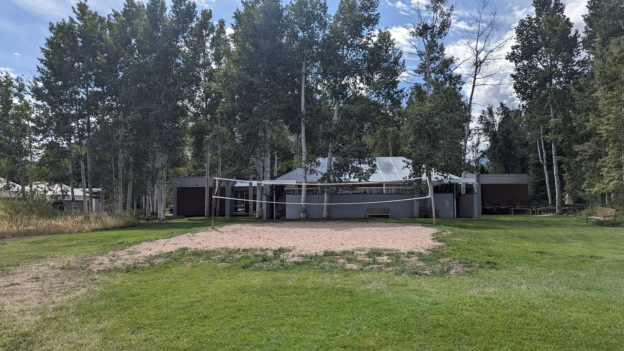 A view of the volleyball court located behind Stanahan Hall