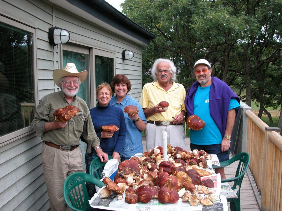 Steve Berry, Carla Berry, Alene Pinsky, Syd Meshkov, and Steve Pinsky displaying the mushrooms they foraged.