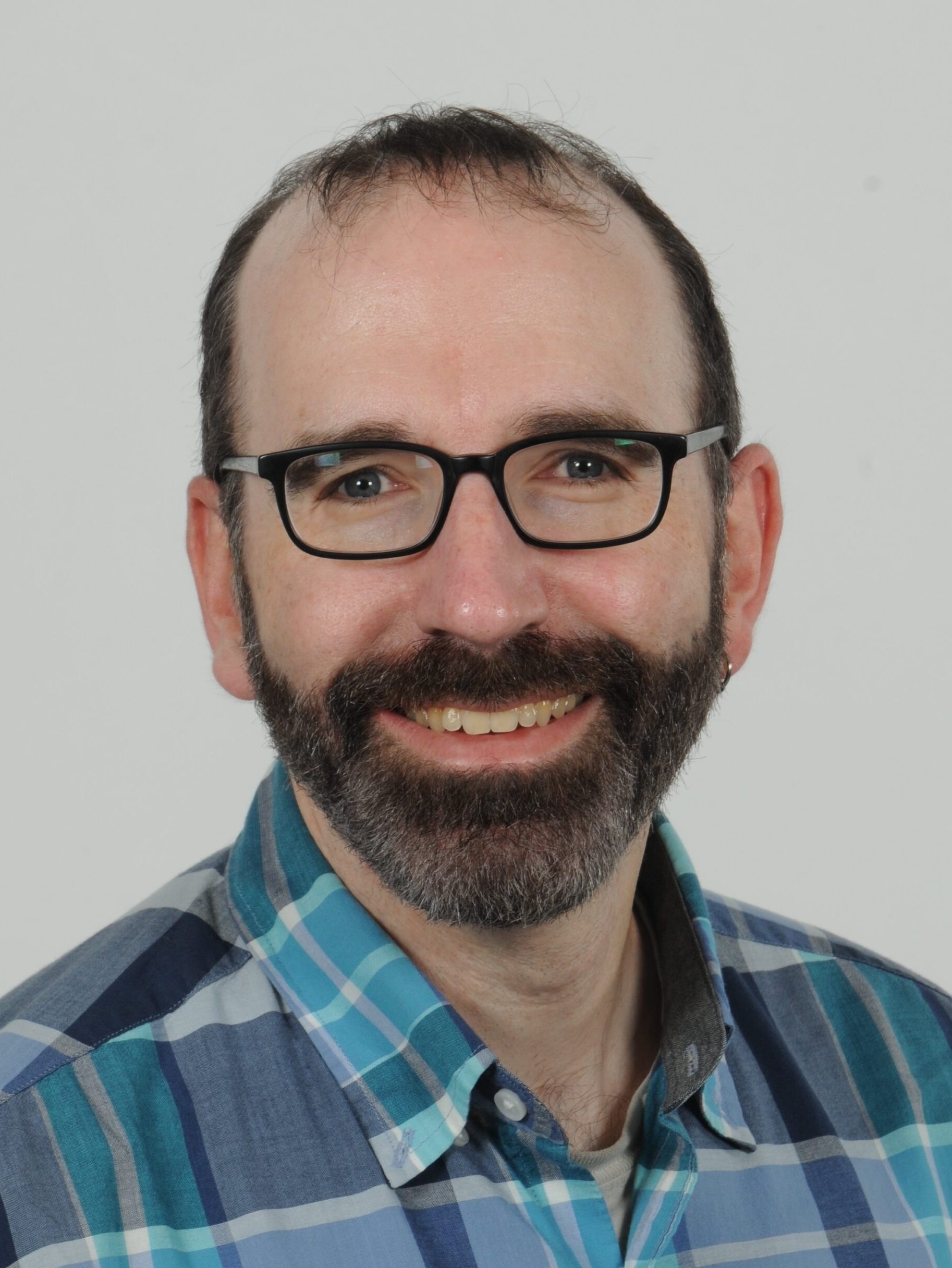 Headshot of Alexander Maloney